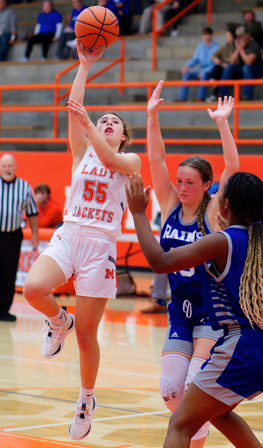 Sophia Hogue puts up a teardrop floater in the lane. [more hoops highlights here]